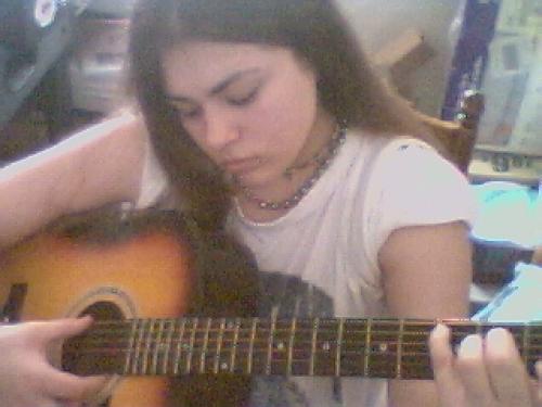 I love my guitar. I play it when I'm sad.