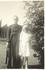 This was my grandmother when she was younger and her godfather.  I like his outfit. 