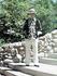 felt fedora, Black and white patent leather dress shoes, linen trousers, 100% cotton shirt.  Comfy.