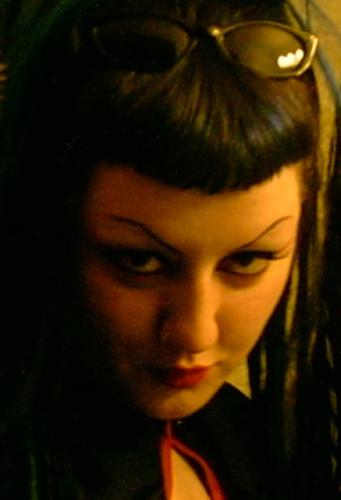 Well here i am again.. This is me before i went to the Covenant/Melotron concert here in portland.. I dig on my makeup.. had to post this