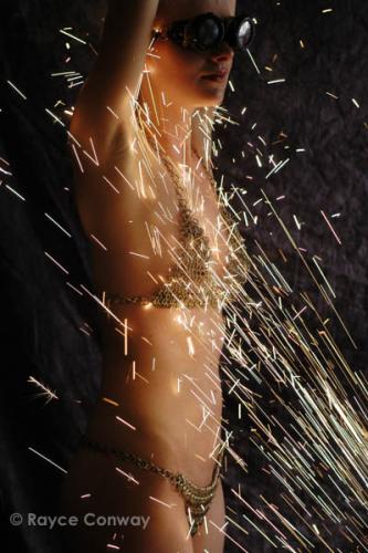 Another one of Anna. Sparks done using a metal grinder. And what is really amazing is this model agreed to do this shoot without EVER meeting me before. Feeling trusted as a professional is a good feeling.