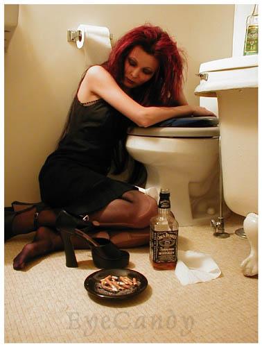 Noel and I had talked about doing a shoot to spoof the photos of Angelina Jolie in the bathroom wearing all white with make-up down her face. So we did a black version of that. So what story do you think this photo tells?