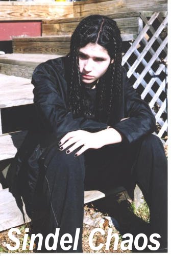 this was taken yesterday(12 8 01) by my mom who  just put my hair in braids.